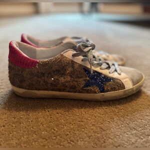 Women’s Golden Goose sneakers.